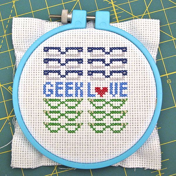 Pattern: Geek Love Cross-Stitch Pattern and Geek Crafts Column on FaveCrafts | Red-Handled Scissors